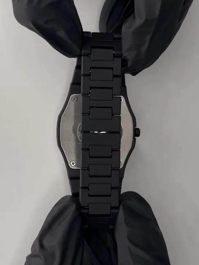 Black Arabic Aura watch dial close up