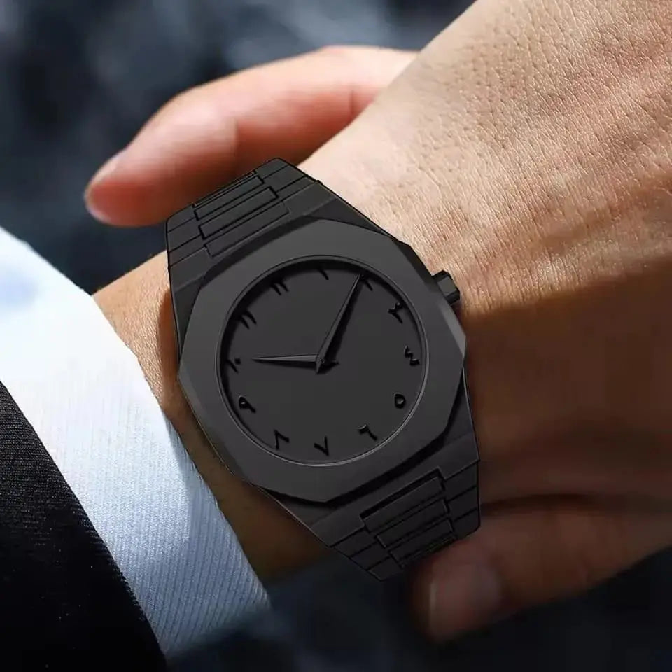 Men's black carbon fiber watch on wrist